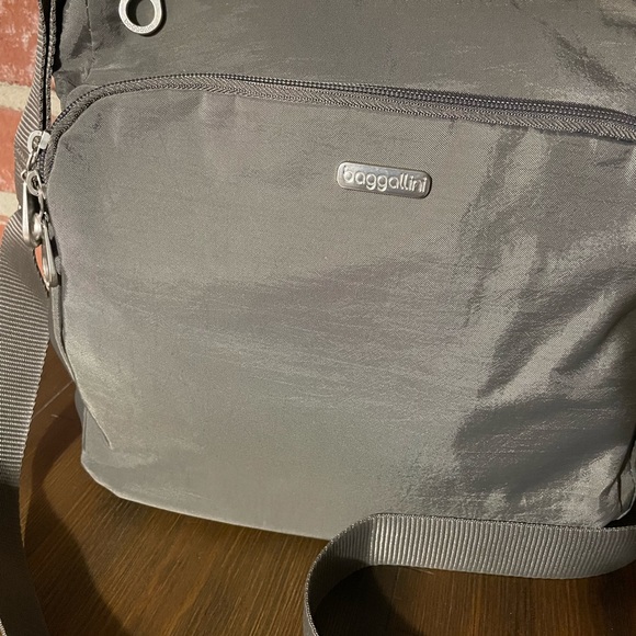 Baggallino Crossbody Bag. Color-taupe. Zipper closures, adj strap. Nylon/Poly. - Picture 2 of 10